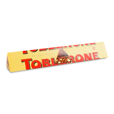 Шоколад молочний Toblerone з нугою з меду й мигдалю